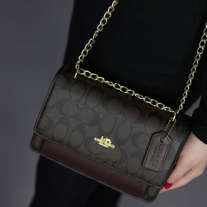 Coach  — mini klare crossbody