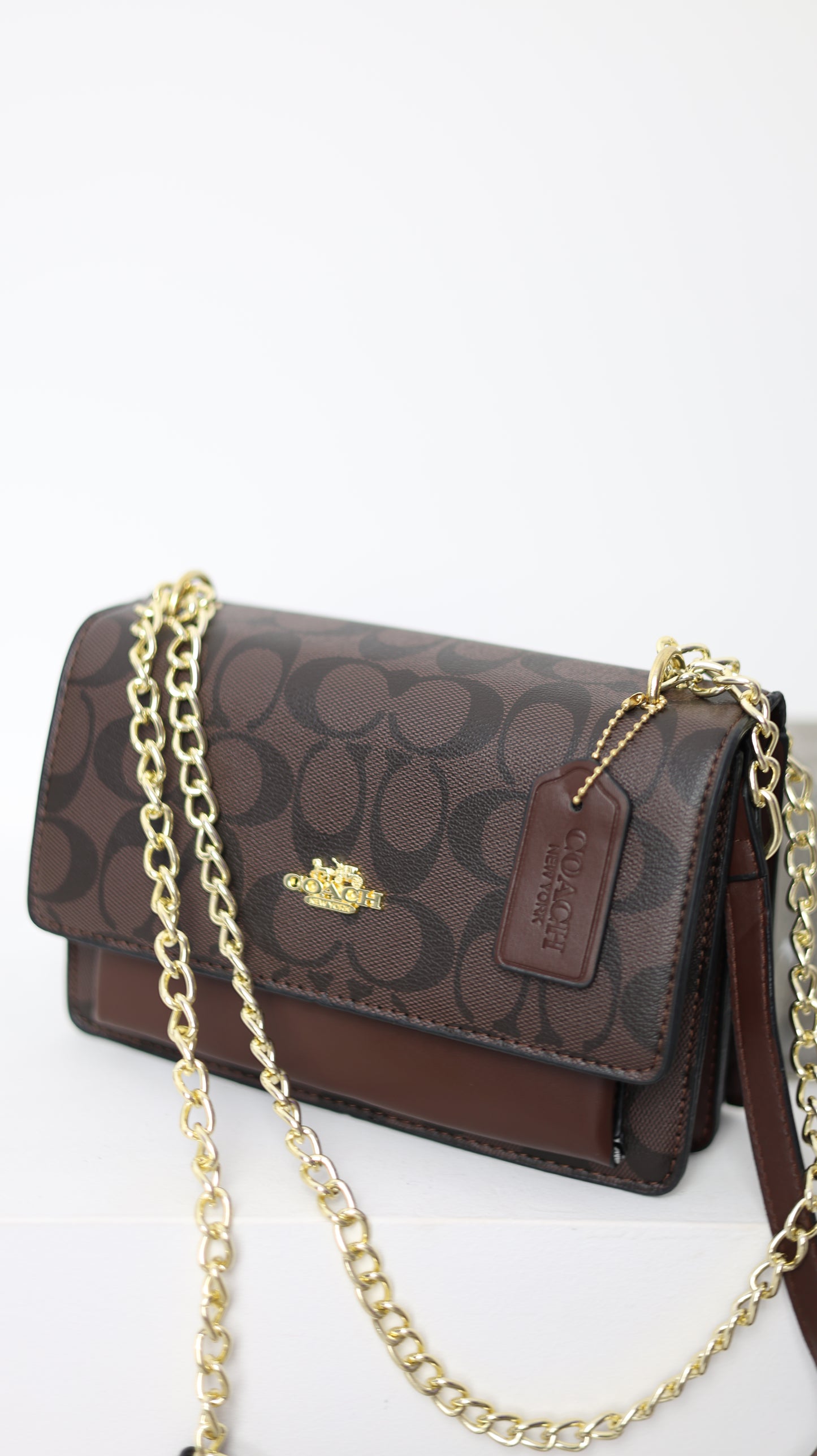 Coach  — mini klare crossbody
